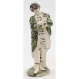 An Italian terraglia figure from the Commedia dell’Arte, c.1800, decorated in green and manganese...