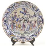 An Italian tin-glazed faience charger, late 19th century, decorated to the well with a mythologic...