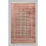 A Persian Bokhara rug, third quarter 20th century, the central field with repeating geometric dia...