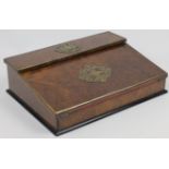 A walnut veneered oak writing slope, 19th century, the lid and cover with elaborate vacant pierce...