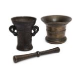 A Dutch or Flemish bronze mortar, 18th century, cast with two bands of scrolls and shells, 14cm h...