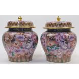 A pair of Chinese cloisonné enamel jars and covers, 20th century, each of tapered form, enamelled...
