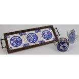 Two pieces of Chinese provincial blue and white porcelain, 19th century, comprising: an oil pot a...