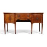 A George III mahogany serpentine fronted sideboard, last quarter 18th century, satinwood and burr...