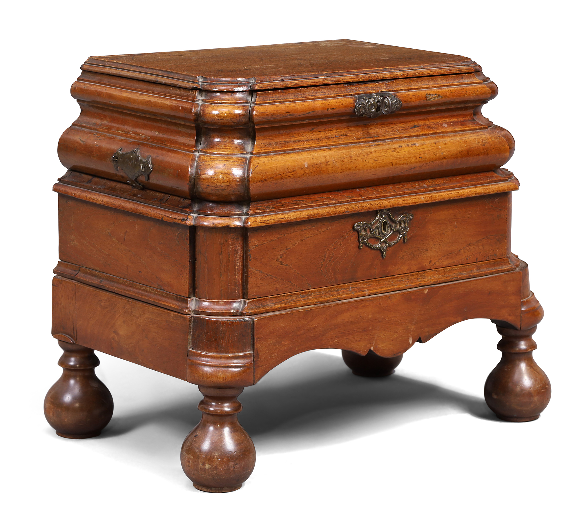 A Dutch bombe oak work box, second quarter 19th century, the hinged top above drawer and side dra...