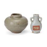 A Chinese twin-handled miniature qingbai vase and a Chinese Longquan celadon-glazed jarlet, Yuan ...