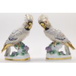 A pair of Continental porcelain figures of cockatoos, 19th century, possibly Samson imitating Che...