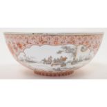 A modern Chinese eggshell style porcelain bowl, decorated in red and gilt with dragons and cartou...