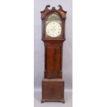 A George III mahogany longcase clock, with broken swan neck pediment over two reeded columns abov...