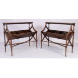 A pair of English mahogany book troughs, in the George III style, 20th century, raised on ring tu...