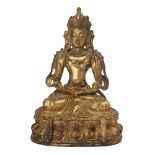 A Sino-Tibetan gilt-bronze figure of Amitayus, Qing dynasty, 18th/19th century, seated in dhyanas...