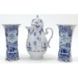 A pair of Dutch deft blue and white vases, 19th century, of octagonal waisted form, each with mou...