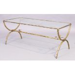A French gilt metal faux bamboo coffee table with glass top, 20th century, in the manner of Maiso...
