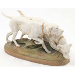 A Royal Dux porcelain figure group of two hunting dogs, 20th century, pink DPM (Duxer Porzellan-M...