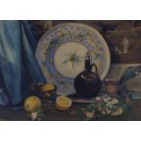 A.K. Metcalfe,  British, early 20th century-  Still life with lemons and a large plate;  waterc...