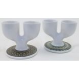 Two Troika Pottery double egg cups, 1960s/1970s, both marked to undersides, with one signed by Li...