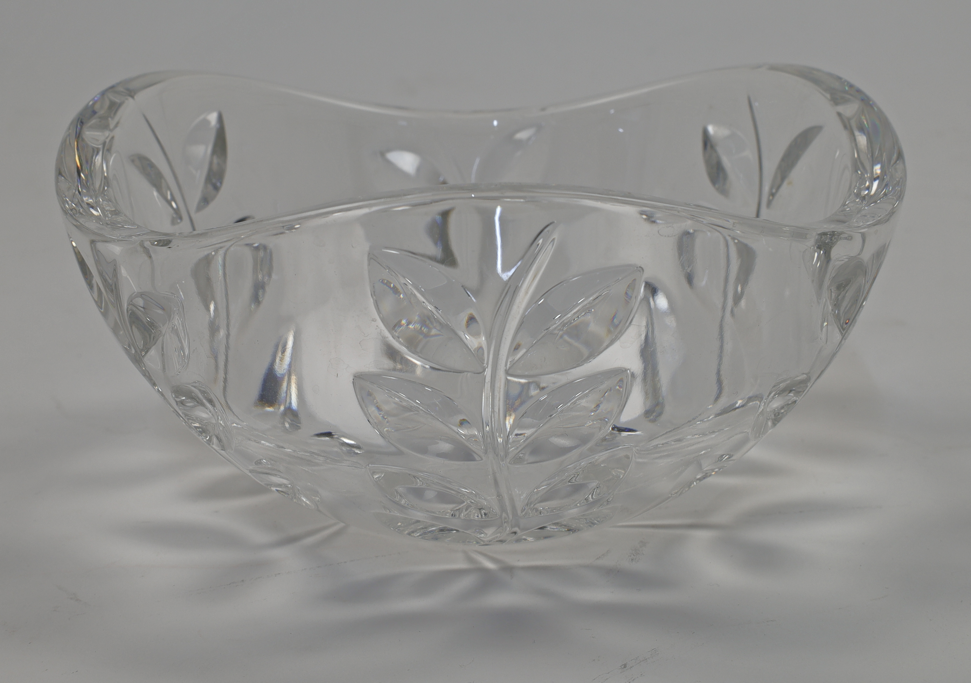 A 'Floral Vine' bowl by Tiffany & Co., 20th century, with undulating rim and moulded leaf vines i...