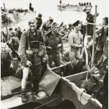 John Humphrey Spender, British 1910-2005, War Time Beach Landing; silver gelatin photograph on ...