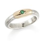 Lalaounis. A single stone emerald stacking ring, the round-cut emerald grain set to the two colou...