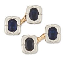 A pair of Russian synthetic sapphire cufflinks, cushion-shaped panels set with a mixed-cut synthe...