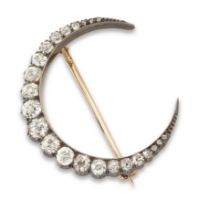 A Victorian diamond crescent brooch, designed as a graduated line of old-brilliant-cut and rose-c...