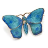 Child & Child. An Edwardian silver gilt and enamel butterfly brooch, the wings and body of tones ...