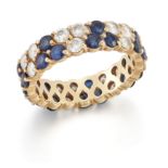 A sapphire and diamond ring, a continuous hoop of brilliant-cut diamonds and round mixed-cut sapp...