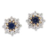 A pair of 18ct gold sapphire and diamond cluster earrings, each with a round mixed-cut sapphire c...