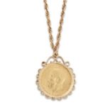 A George V sovereign, 1914, spectacle set to a 9ct gold pendant mount, London hallmarks, 1969, su...