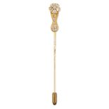 A Victorian diamond set stickpin, a realistically textured claw set with cushion-shaped old brill...