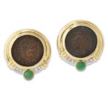 A pair of emerald and diamond-set Roman coin earclips, each mounted with a Roman bronze coin of C...