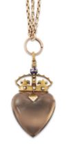 A late 19th/early 20th century gold smoky quartz heart and crown pendant and neckchain, the penda...