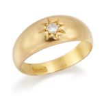 An early 20th century gold single stone diamond ring, the old brilliant-cut diamond, star set to ...