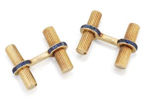 Van Cleef & Arpels. A pair of interchangeable baton sapphire set cufflinks, double-sided, with re...