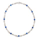 Anthony Hawksley. A silver and lapis lazuli necklace, with twisted silver links and lapis lazuli ...
