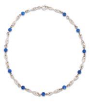 Anthony Hawksley. A silver and lapis lazuli necklace, with twisted silver links and lapis lazuli ...