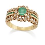 An emerald and diamond ring, the emerald-cut emerald and brilliant-cut diamond cluster, to pierce...