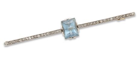 An aquamarine and diamond bar brooch, the claw-set rectangular mixed cut aquamarine to single-cut...