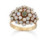 An emerald and opal cluster ring, the round cut emerald to surround of cabochon opals, claw-set, ...