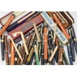 A large collection of pens and writing implements, by manufacturers including Parker, Burnham, Co...