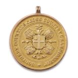 A 9ct gold running medal, Southern Counties Cross Country Championship, engraved 'Highgate H 1st ...
