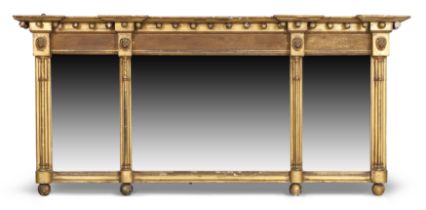 A Victorian triple plate giltwood overmantel mirror, third quarter 19th century, with triple gun ...