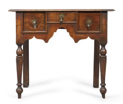 A William and Mary walnut lowboy, last quarter 17th century and later, the rectangular top above ...