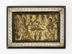 A Flemish parcel-gilt bronze plaquette of the Last Supper, late 16th century, with Christ seated ...