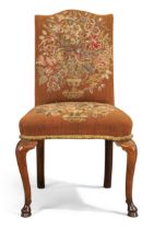 A George I walnut side chair, first quarter 18th century, with floral tapestry upholstery, on cab...