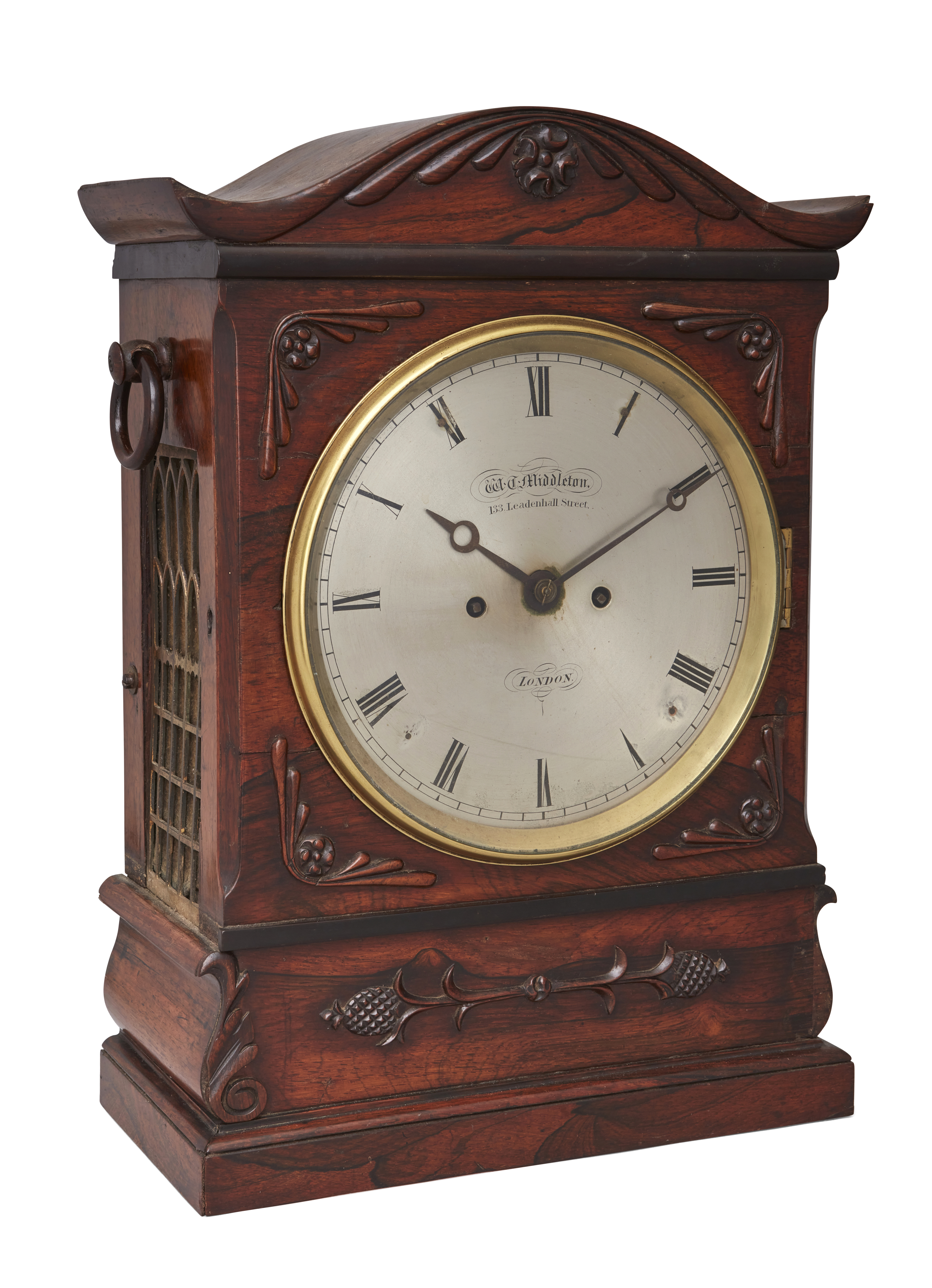 A Victorian rosewood bracket clock, mid-19th century, with shaped top above applied honeysuckle c...