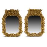 A pair of English parcel silvered and gilt composite mirrors, second quarter 19th century, each l...