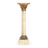 A gilt-bronze mounted onyx pedestal column, early 20th century, the square plateau above a Corint...