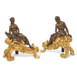 A pair of French gilt and patinated bronze figural chenets, of Louis XV style, 19th century, one ...