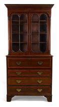 A George III mahogany line inlaid and satinwood crossbanded secretaire bookcase, last quarter 18t...